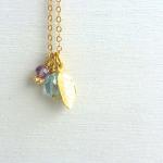 Leaf Charm Necklace in Gold..